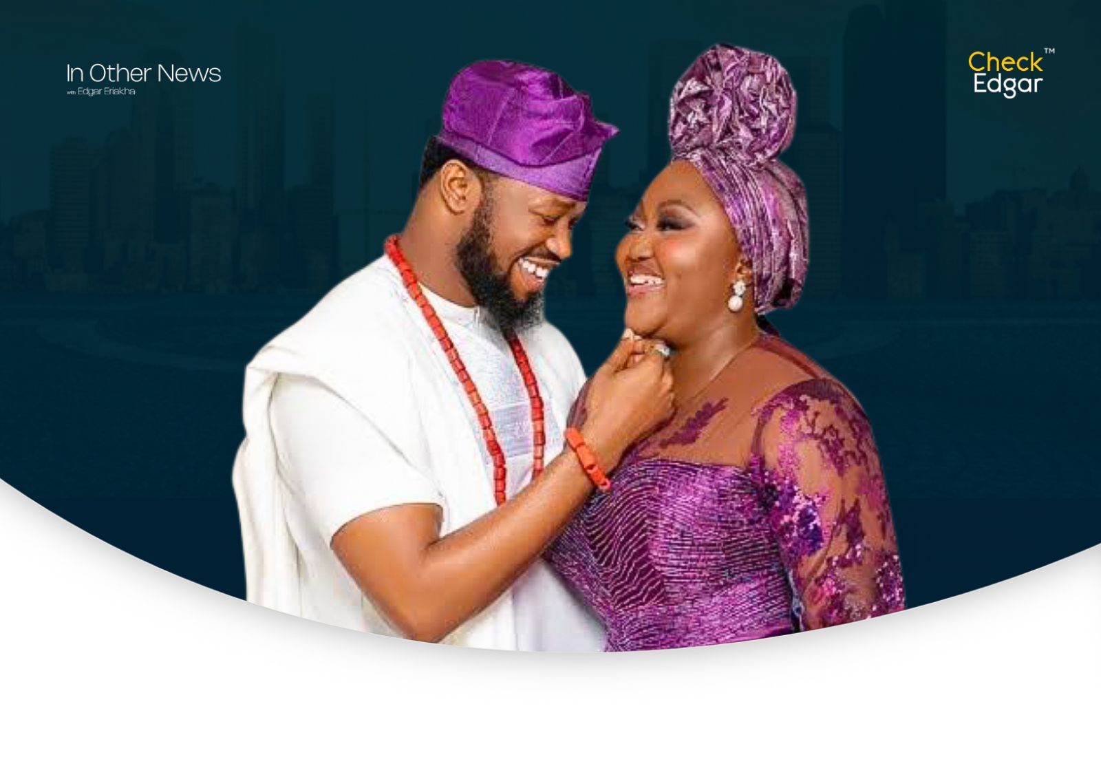 Blessing and Stan Nze in matching purple traditional clothing, smiling at each other.