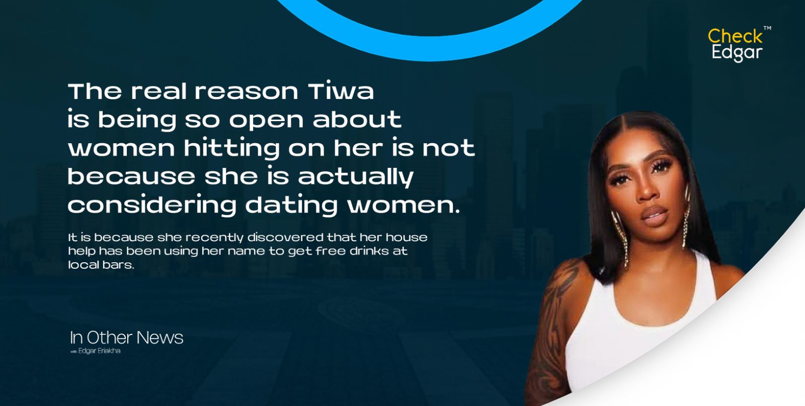 Tiwa Savage with long hair and earrings poses confidently.