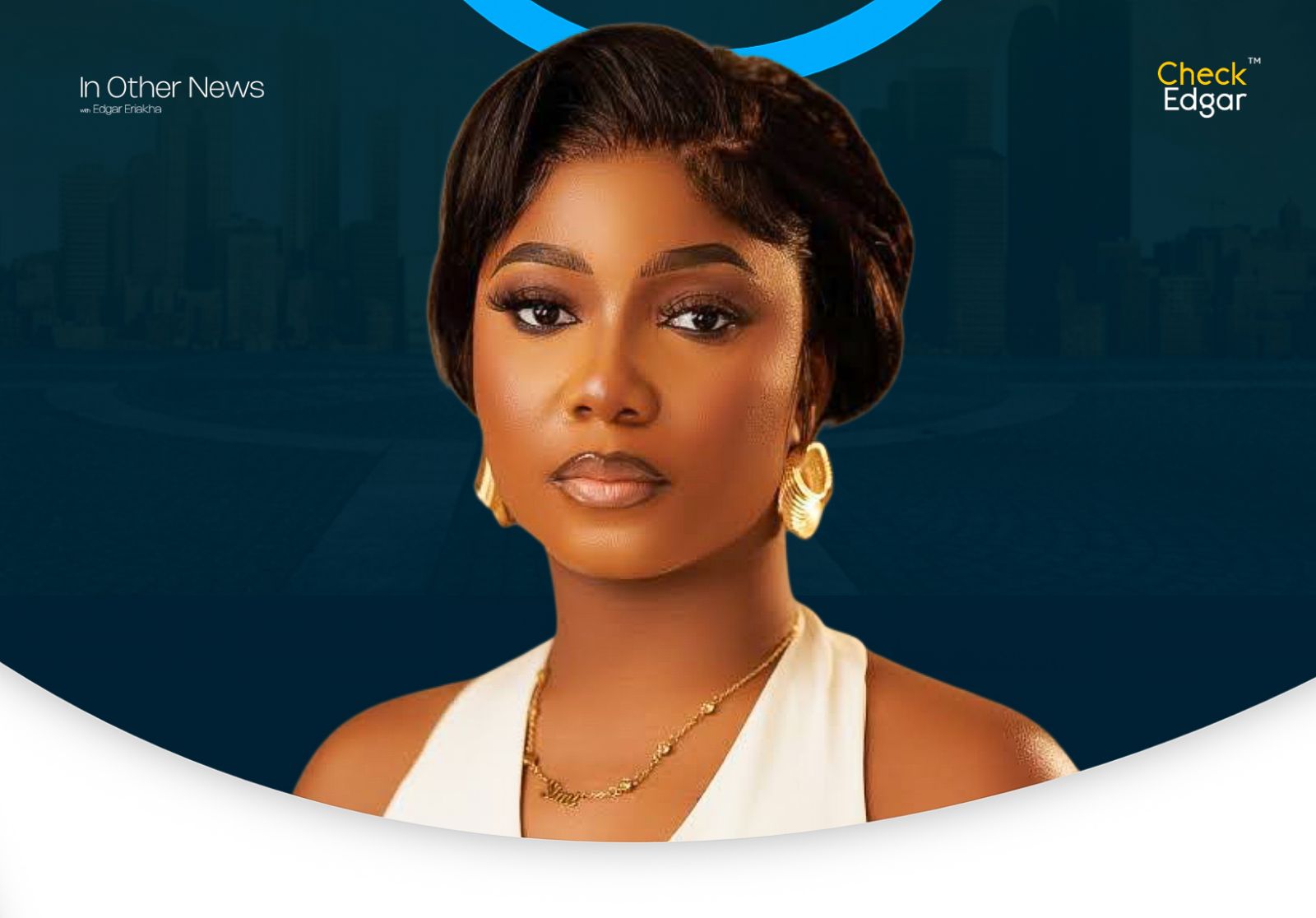Simisanya with a confident expression, wearing a white top and gold jewelry.