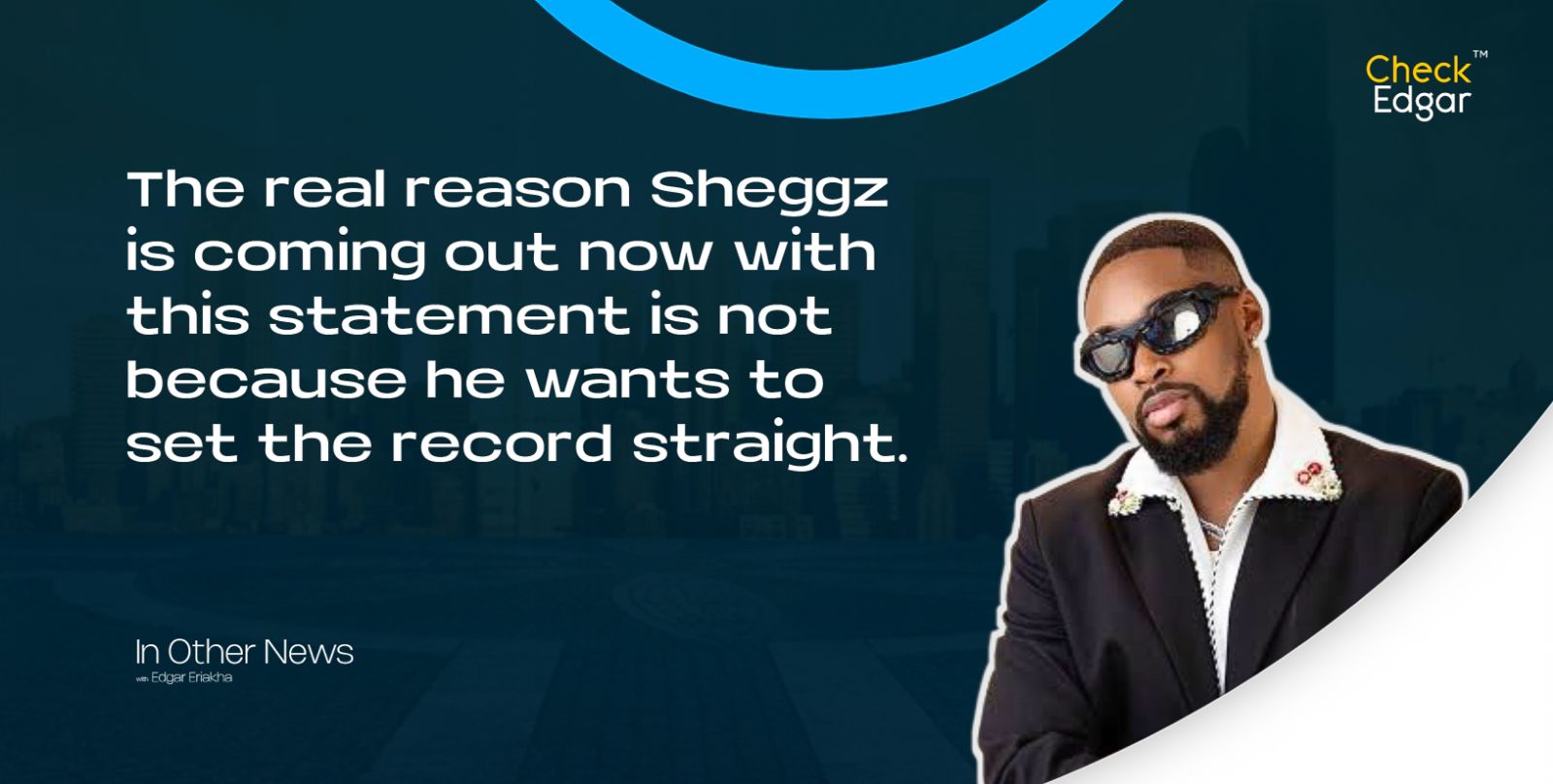 Sheggz in sunglasses poses confidently in a stylish outfit.