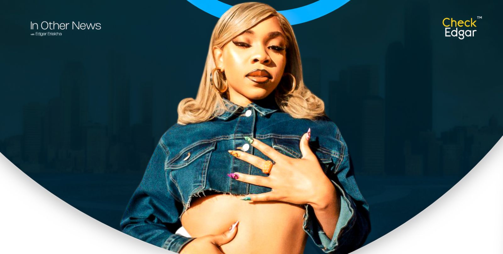 Fave with blonde hair poses confidently in a denim jacket and hoop earrings.
