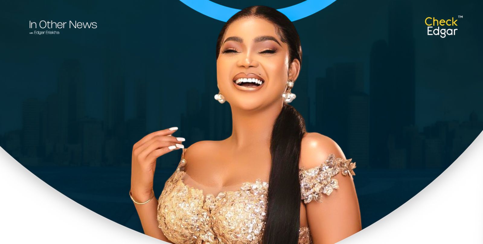 Rachael Okonkwo with long hair smiles broadly, wearing a sparkling gold dress and pearl earrings.