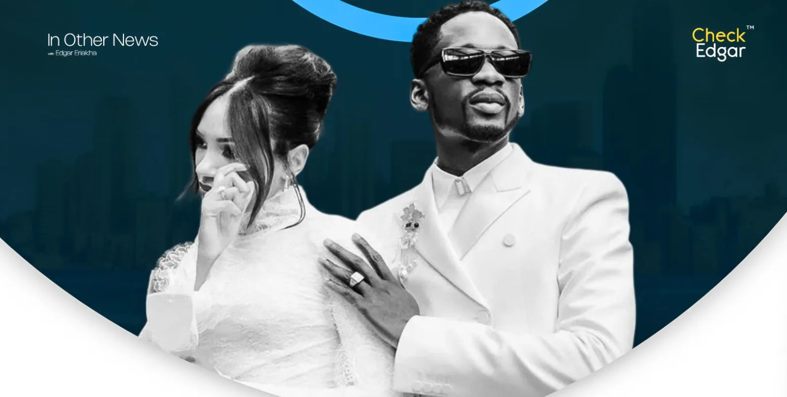 Temi Otedola in a white dress gestures while Mr Eazi in a white suit poses beside her.
