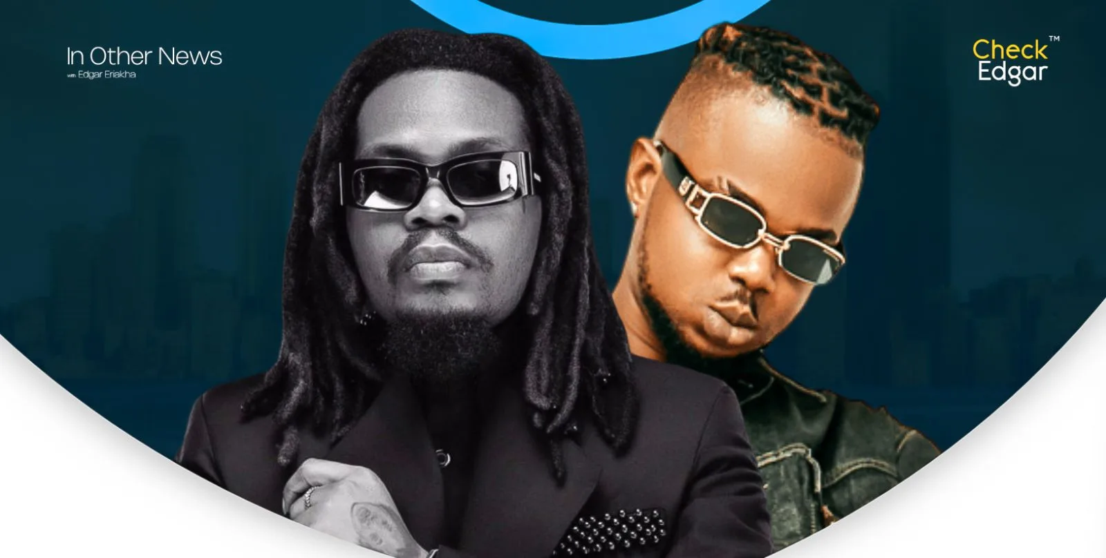 Olamide in a black suit and Rexxi in a denim jacket.