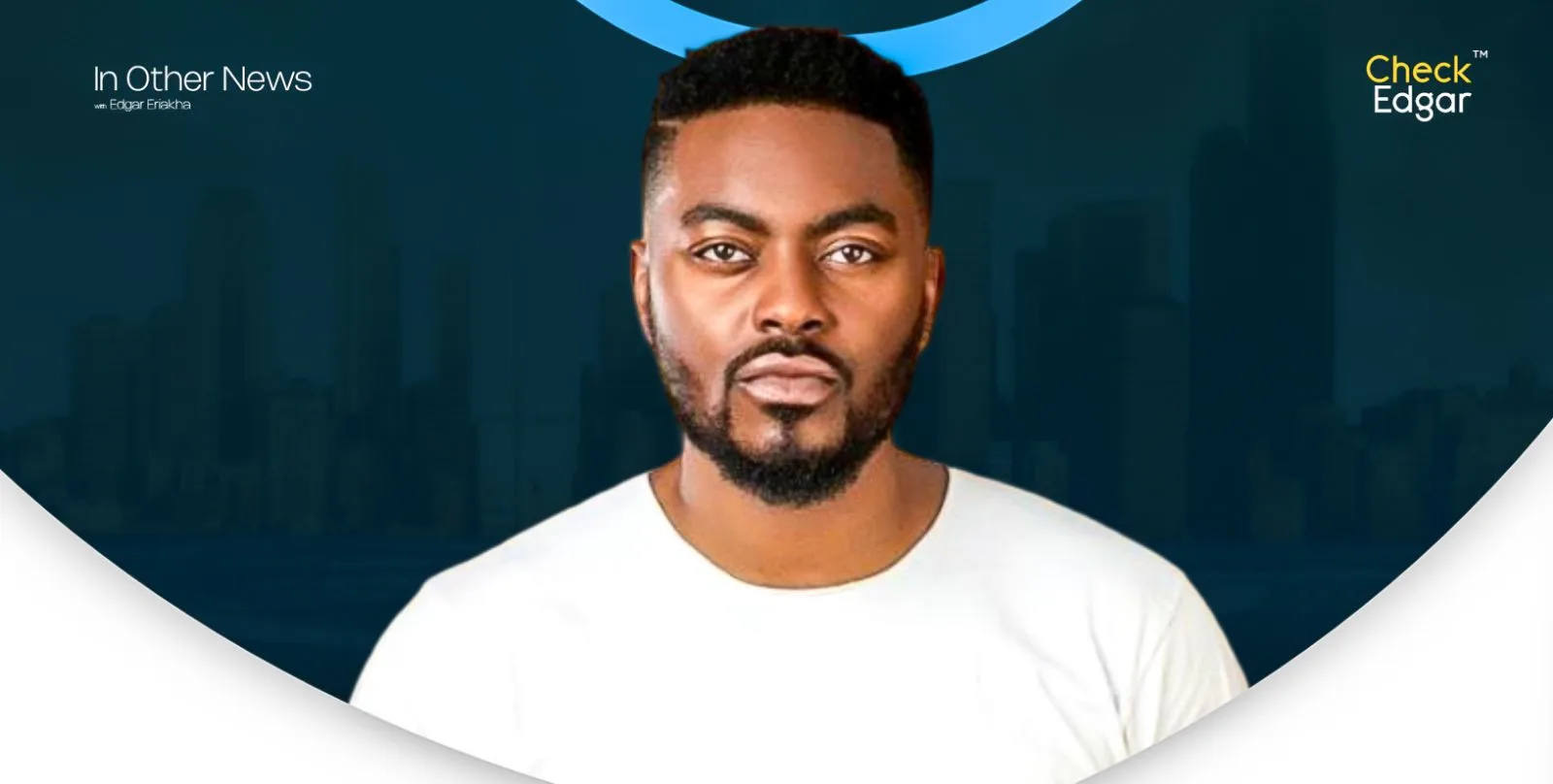 Tayo Faniran with a beard in a white shirt.