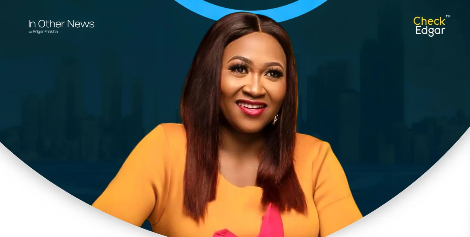 Mary Njoku with straight hair in an orange dress expresses joy in a studio setting.