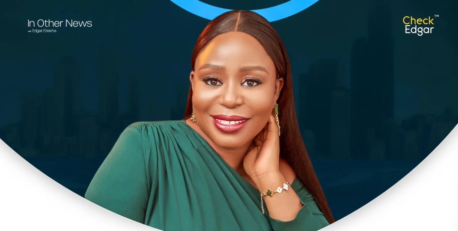 Portrait of Toyosi Etim-Effiong with glowing skin and long hair, wearing a green outfit.