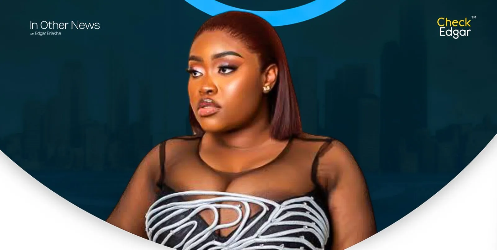 Close-up of Bo Hair with a confident expression, wearing a chic sheer top.