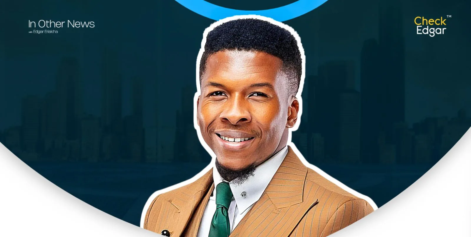 Pastor Iren with short hair is smiling, wearing a brown suit and green tie.