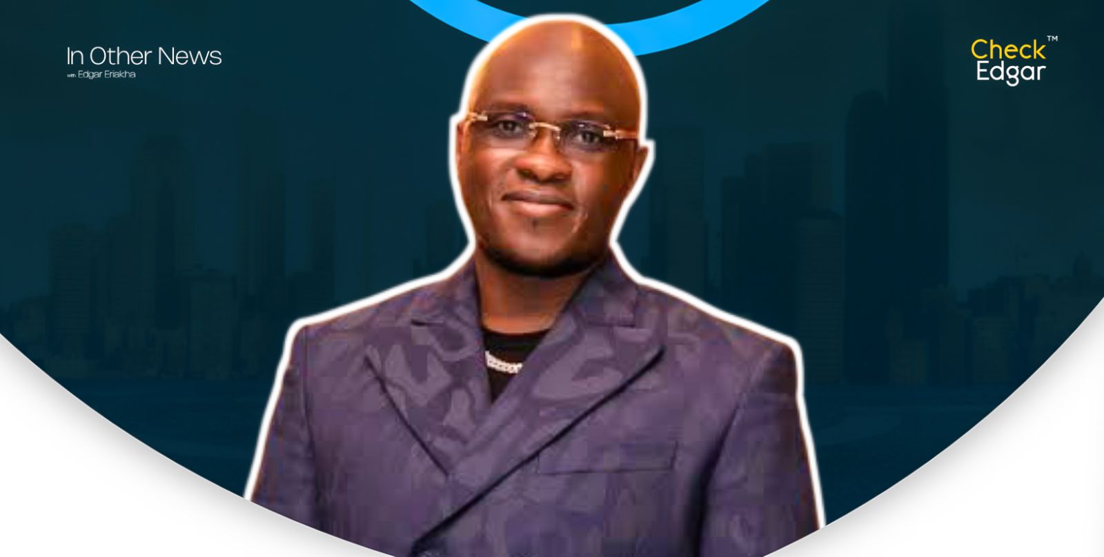 Pastor Tobi Adegboyega in a stylish suit smiles confidently.