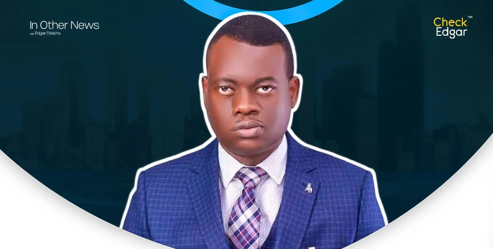 Apostle Arome Osayi in a blue suit with a patterned tie.