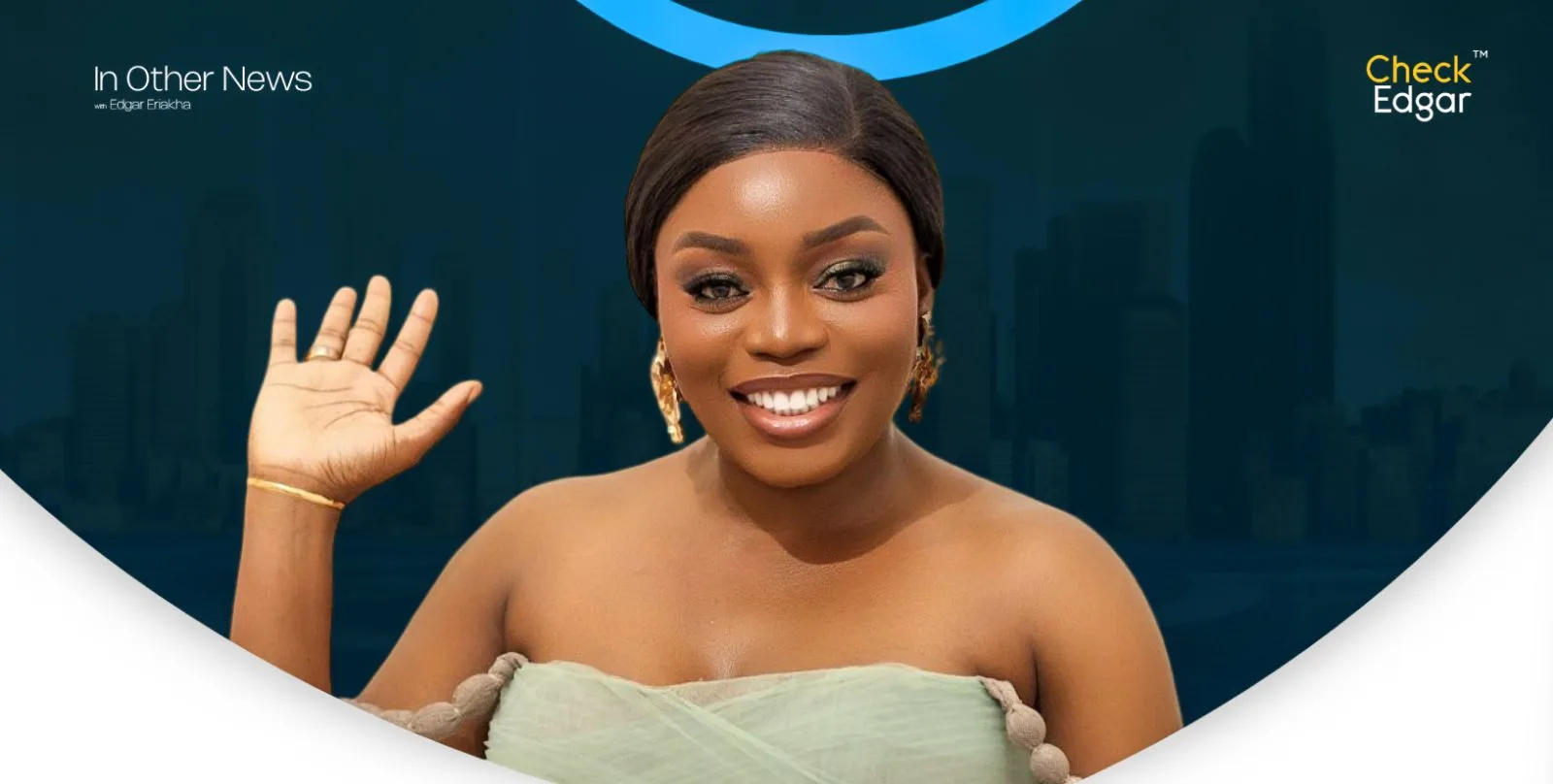 Bisola Aiyeola in an elegant outfit waves at the camera.
