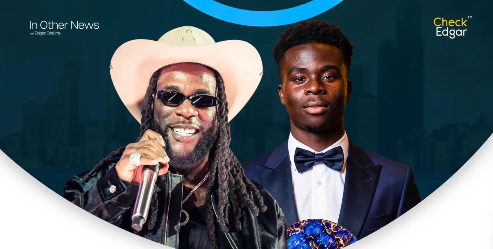 Burna Boy in a hat and jacket poses next to Bukayo Saka with a trophy.